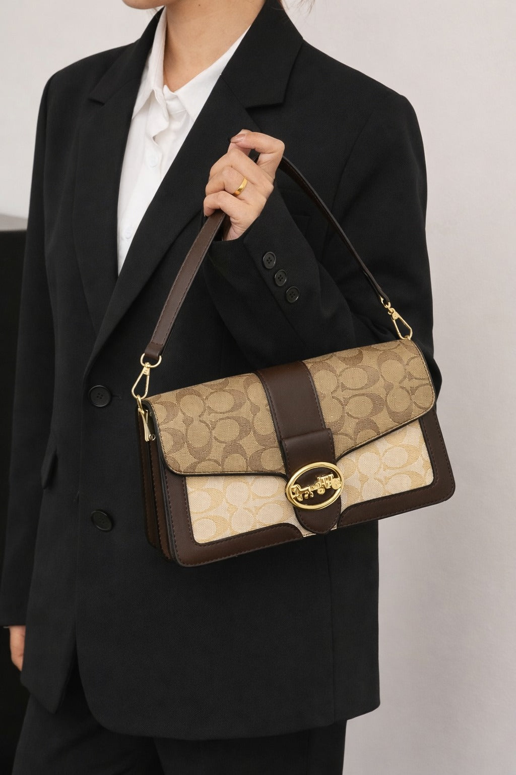The “Heritage Carriage” Signature Shoulder Bag