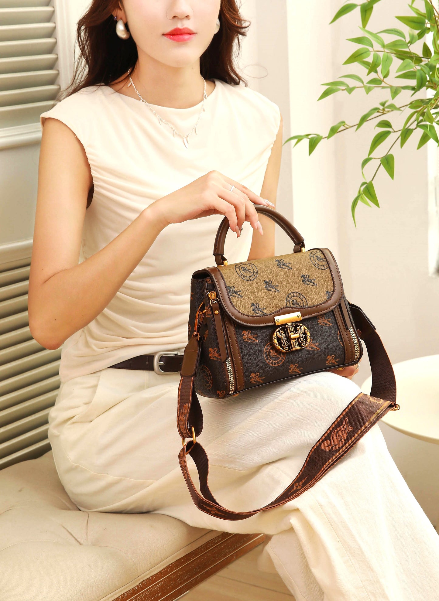 The "Signature Crest" Satchel