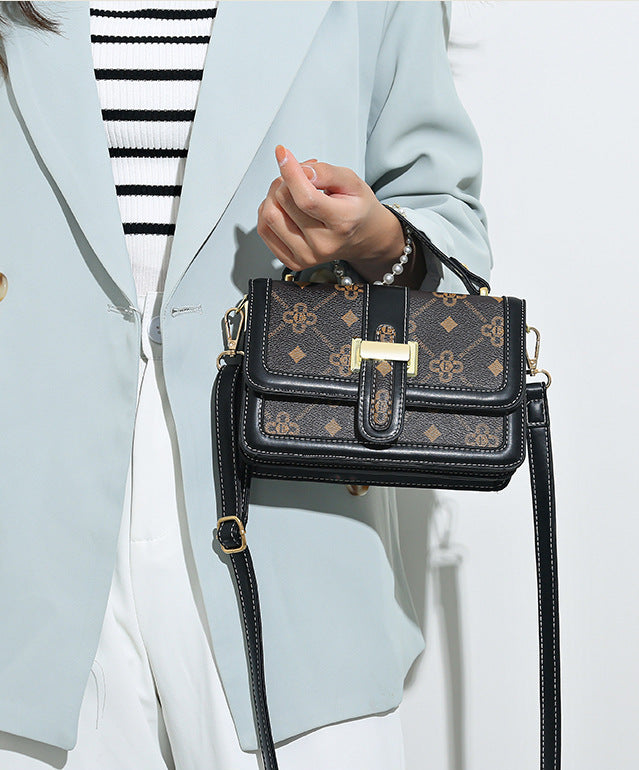 The Status Satchel