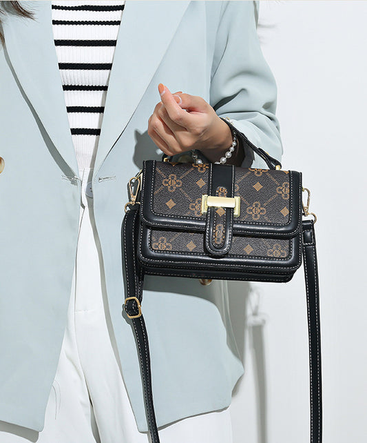 The Status Satchel