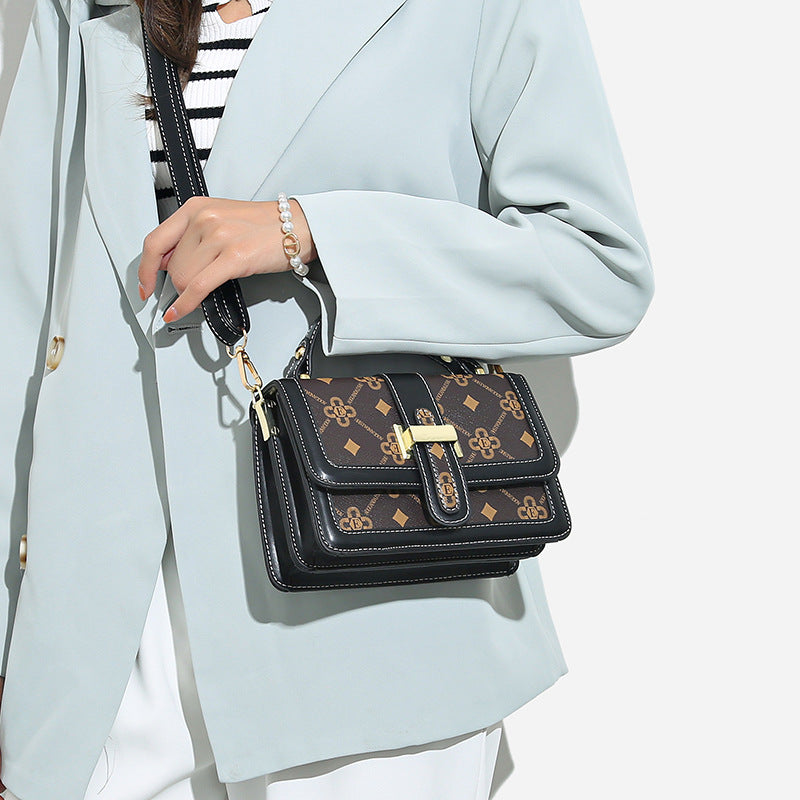 The Status Satchel