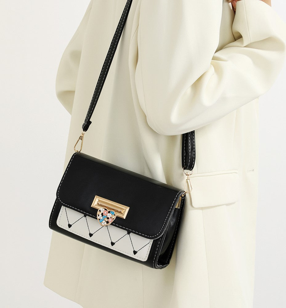The Heart-Quilt Crossbody in Onyx & Alabaster